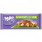 Preview: Milka Ganze Haselnüsse 270g XXL-Tafel aus Alpenmilchschokolade mit ganzen Haselnüssen